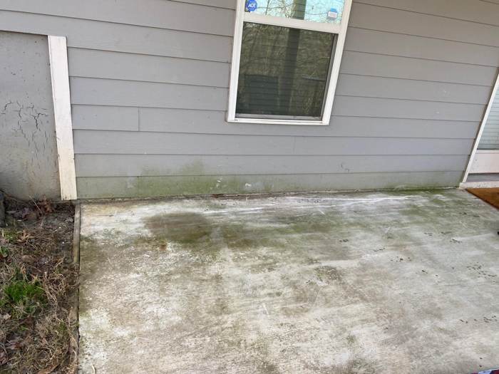 Cleared, empty patio after junk removal